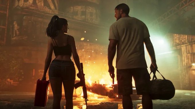 Two people walking away from a burning car in an industrial yard.